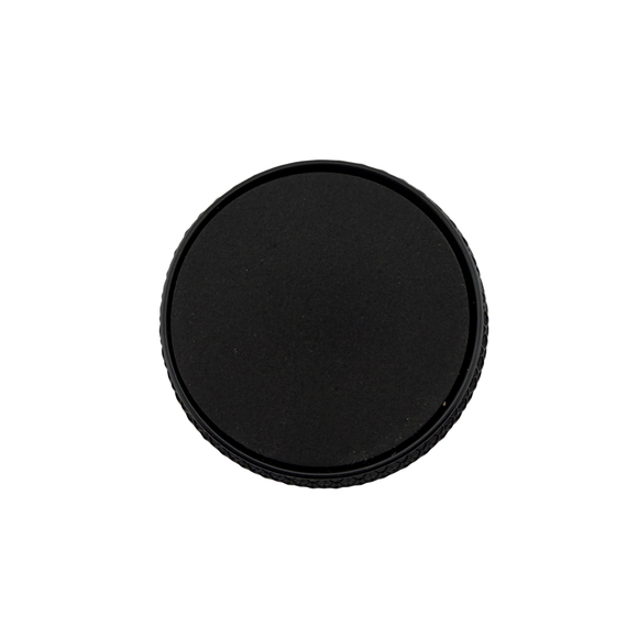 Black circular object on a white background
