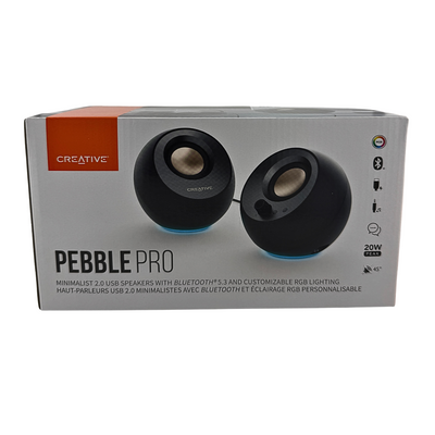 Box of Creative Pebble Pro speakers on a white background