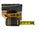 Black and yellow strap with a tape measure on a white background