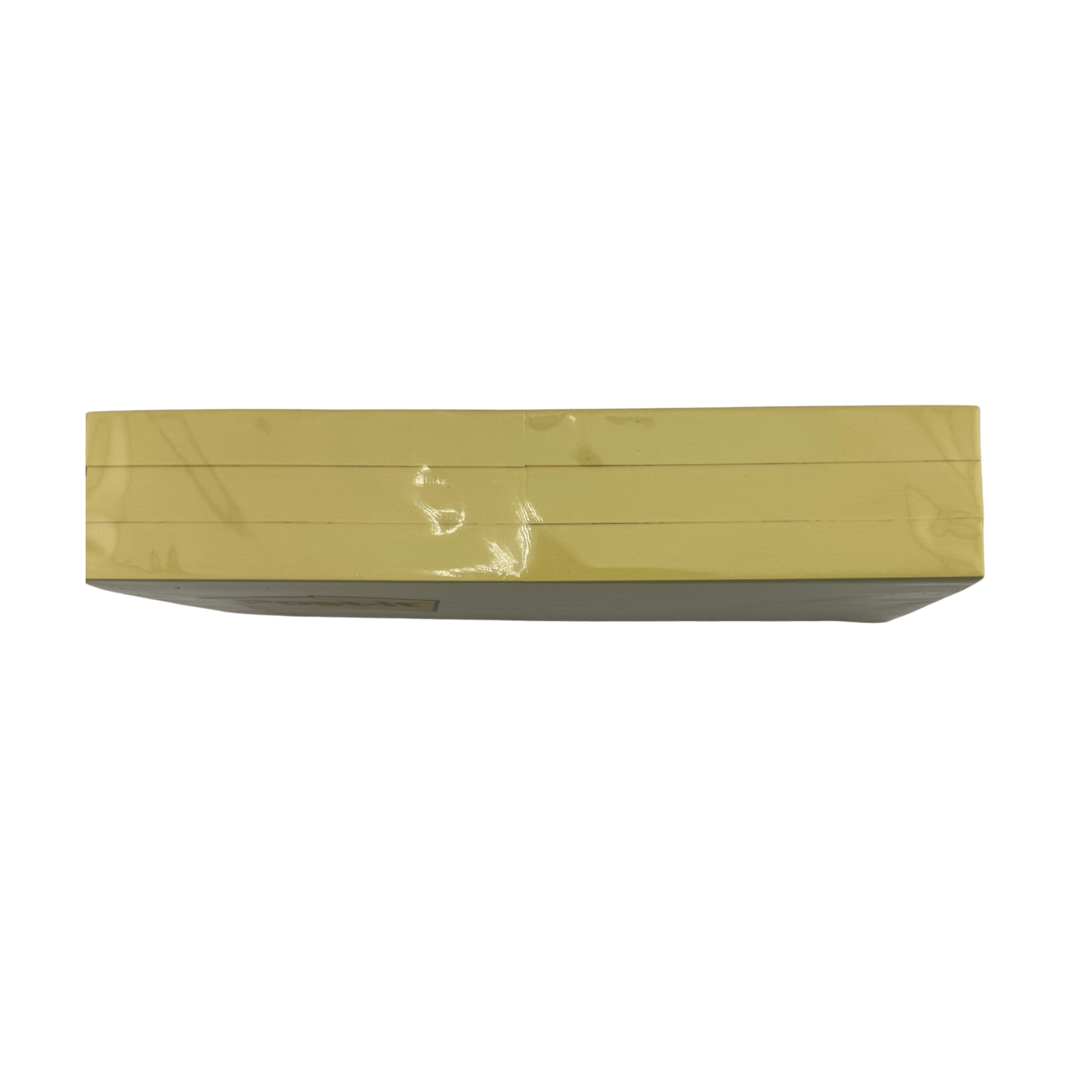 Yellow rectangular object with a reflective surface on a white background
